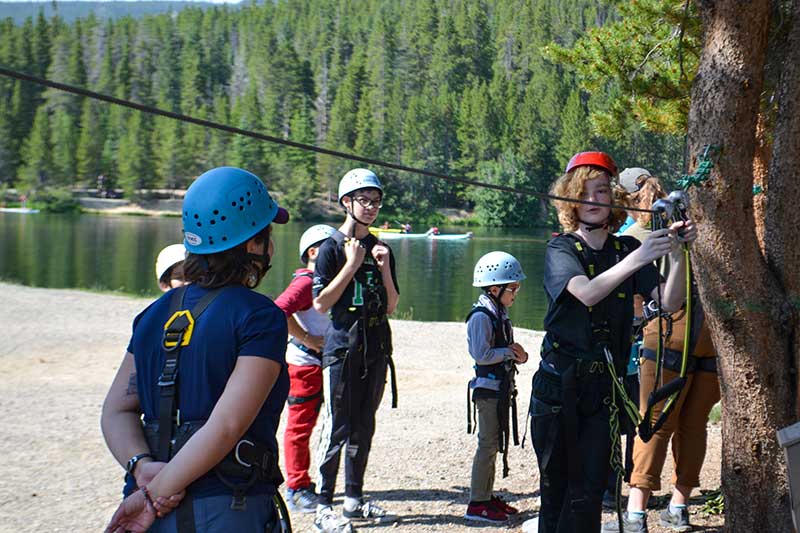 BOEC Wilderness Camp participants learn the basics of harnessing