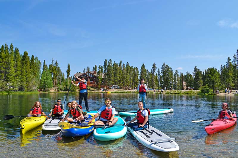 BOEC Wilderness Camp participants pose while in their boats