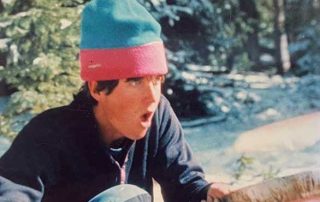 Earl Richmond gets the fire going on an outdoor BOEC program