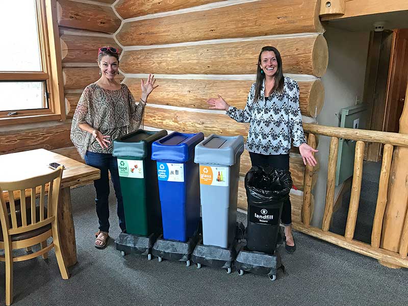 Hallie and Allie pose with new recycling bins