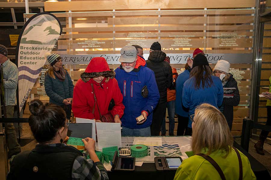 BOEC staff checks tickets at Banff Film Festival