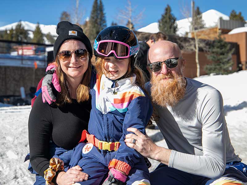 Ellie, Cecilia, and Billy Bennett pose for a picture at Breckenridge Ski Resort.