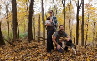 Ben, Holly and baby Lincoln in the woods of Indiana
