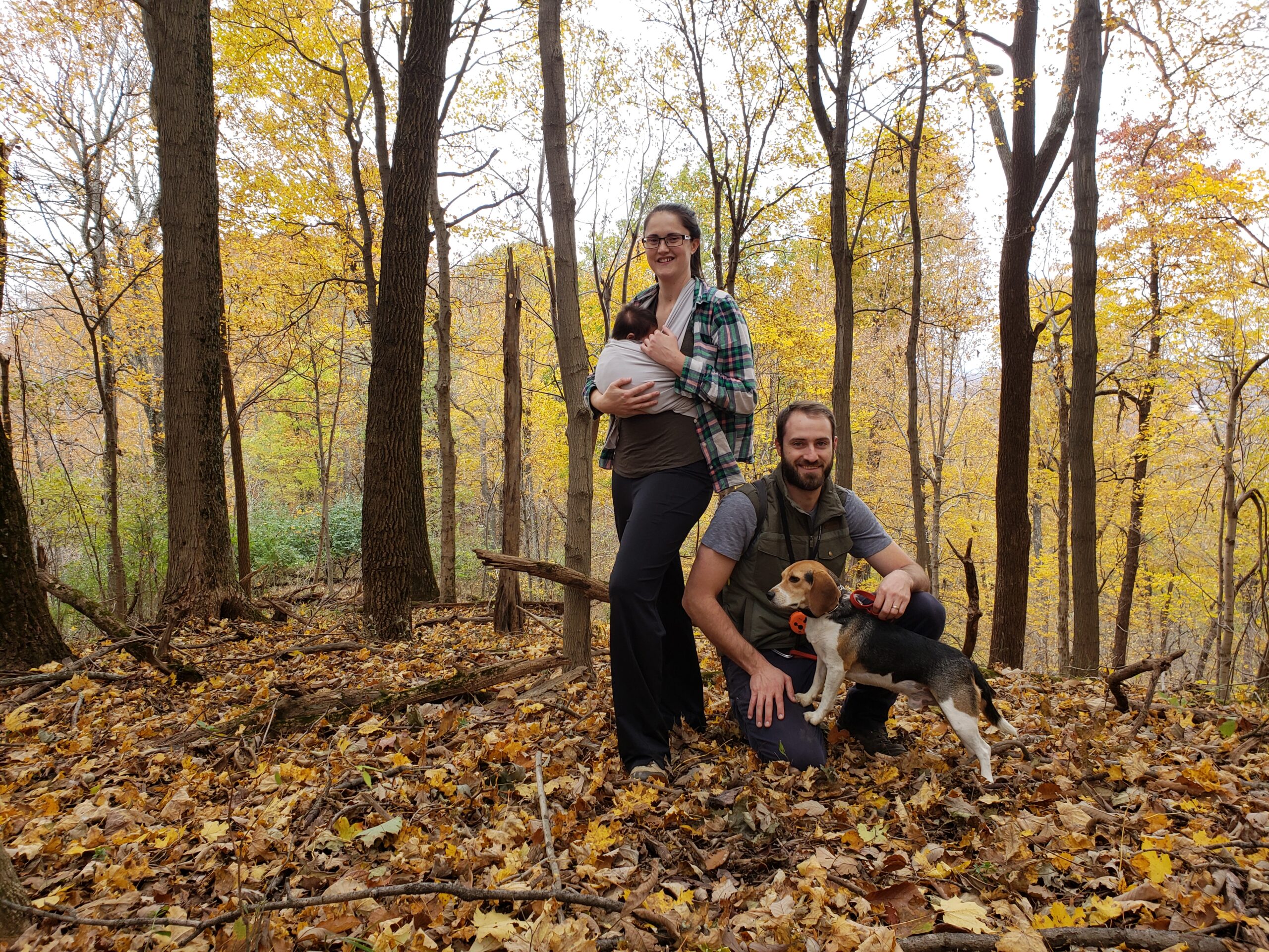 Ben, Holly and baby Lincoln in the woods of Indiana