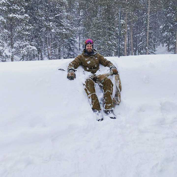 Ben takes a break in a snow bank