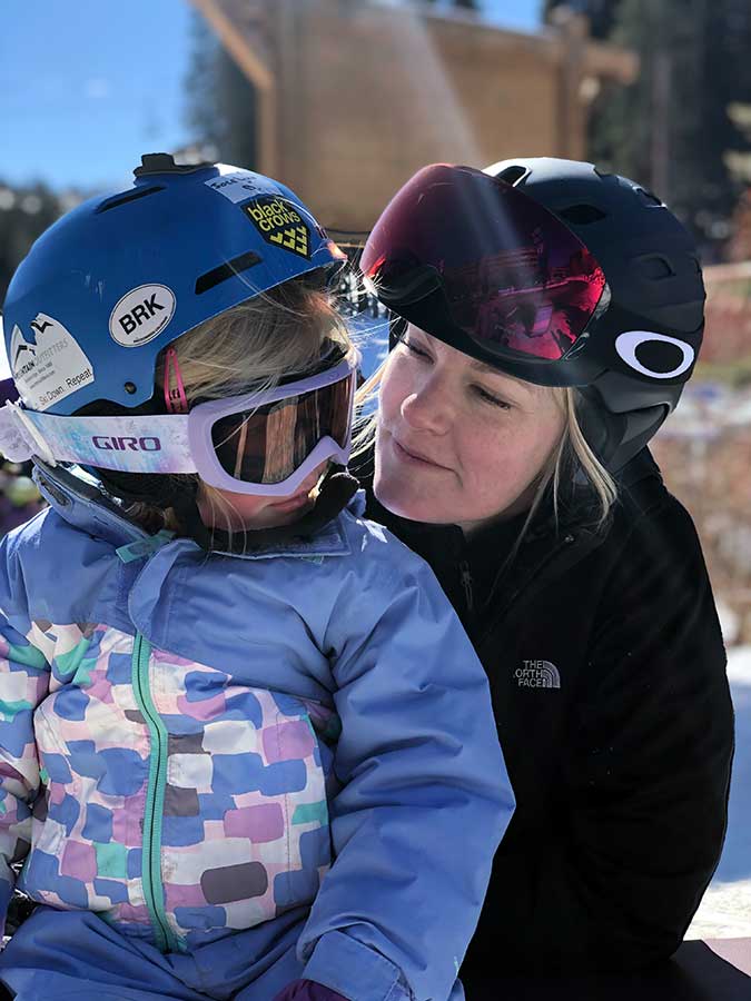 Erin and her daughter share a special moment while skiing