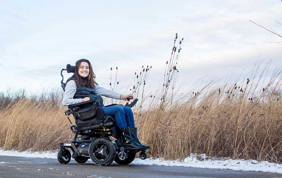 Amber tackles the open road in her wheelchair