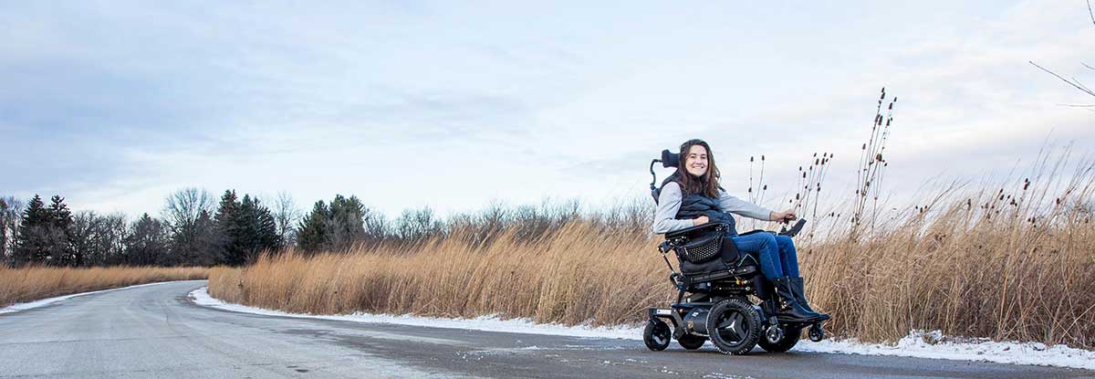 Amber tackles the open road in her wheelchair