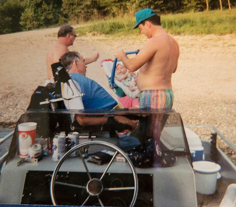 Robert Ayers, a paraplegic, goes fishing