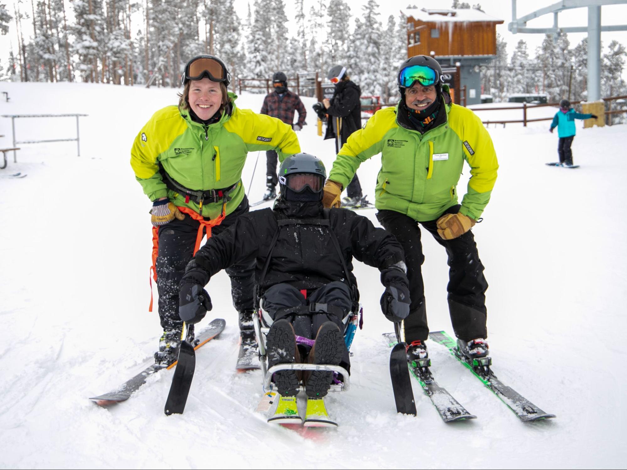 Frank and Tyler with a student from Adaptive Adventures.