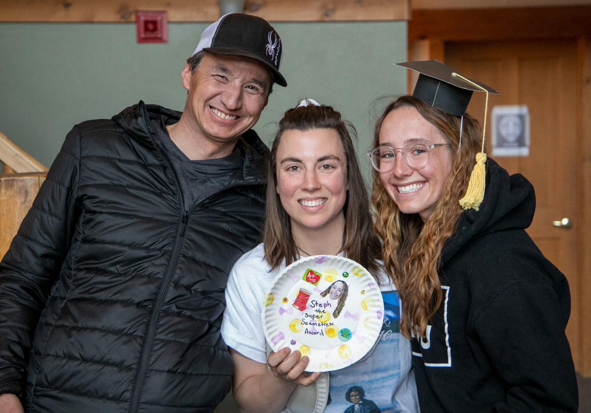 Steph, Kat, and Jeff (right to left) at Steph’s intern graduation where she won the Super Seamstress Award.