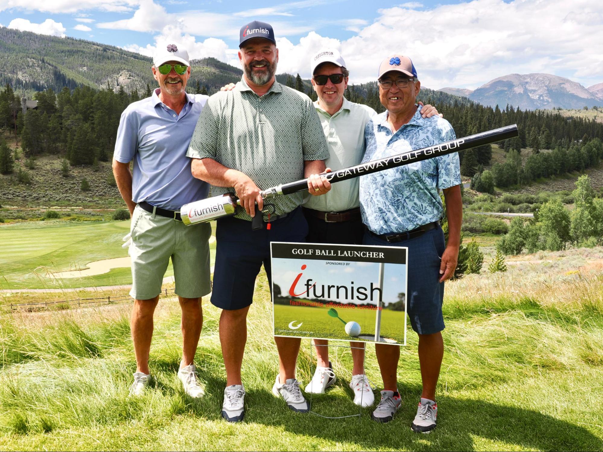 Our steadfast sponsors from iFurnish and Creative Cabinetry out on the course.