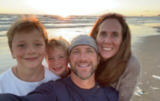 Board Member, Kristen Bennett, enjoying the beach with her family.