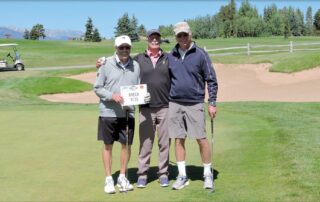 Ted Lawson, middle, at BOEC’s Tee It Up Golf Scramble.